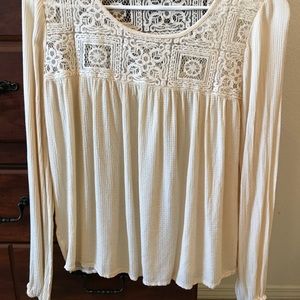 Long sleeve cream dress shirt.